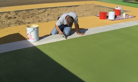 Spielfläche auf Beton mit Betonfarbe Spielfläche aus Beton mit Betonfarbe